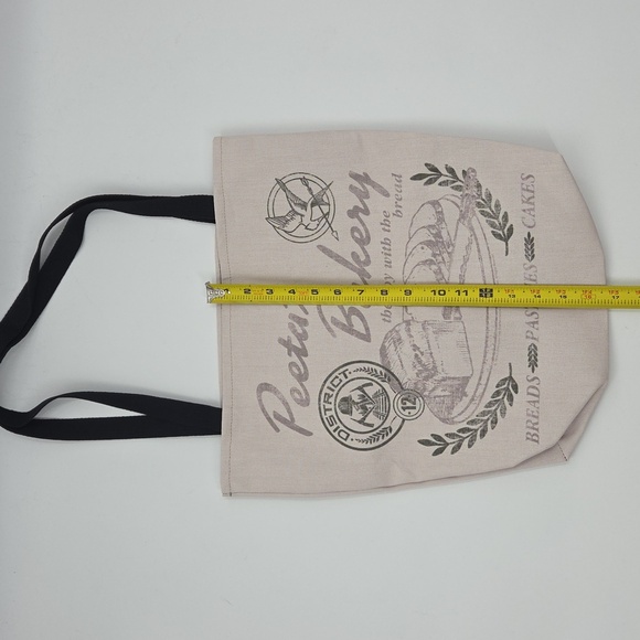 The Hunger Games Peeta's Bakery Cream Tote Bag - Picture 16 of 16